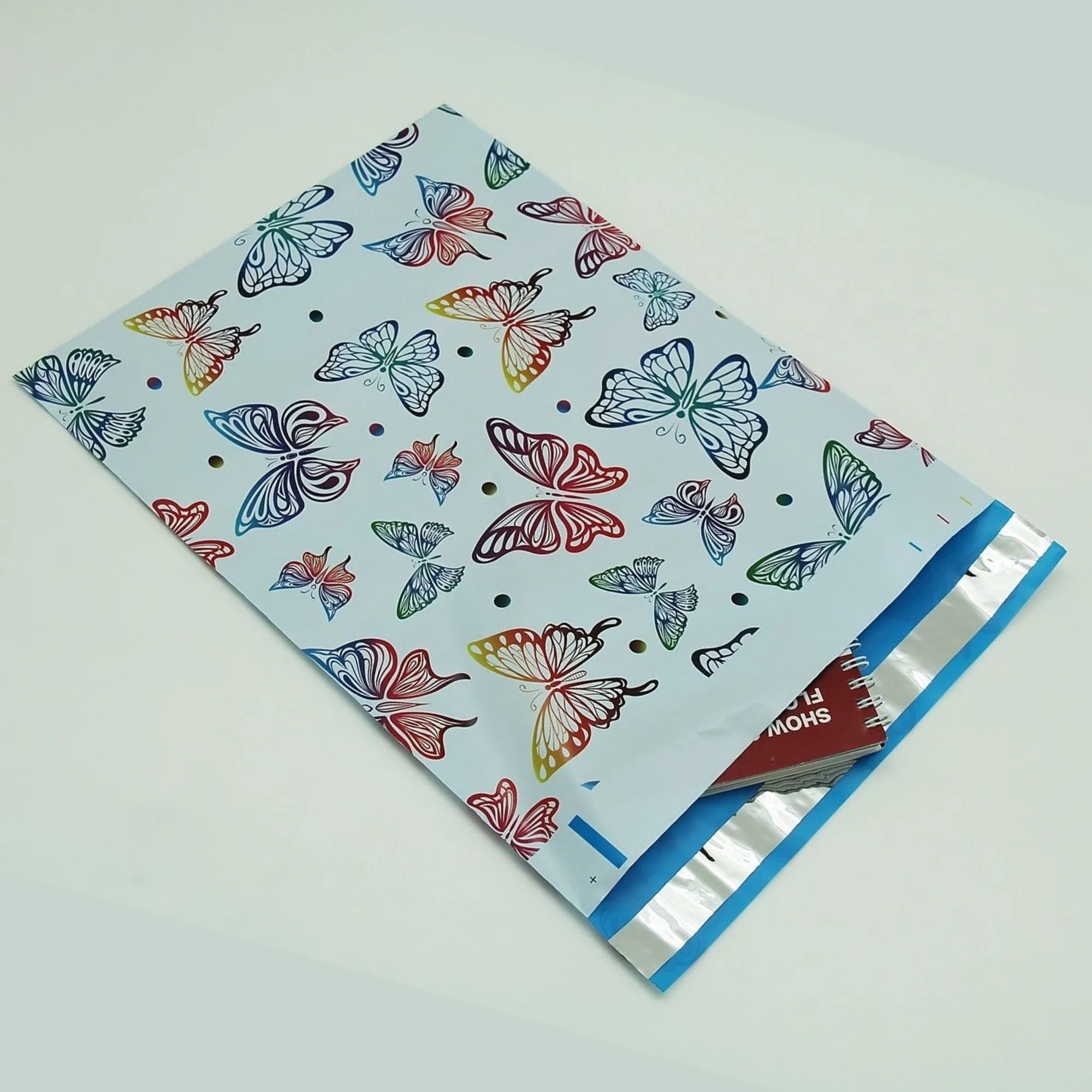10 x 13 envelope with colorful butterfly design.